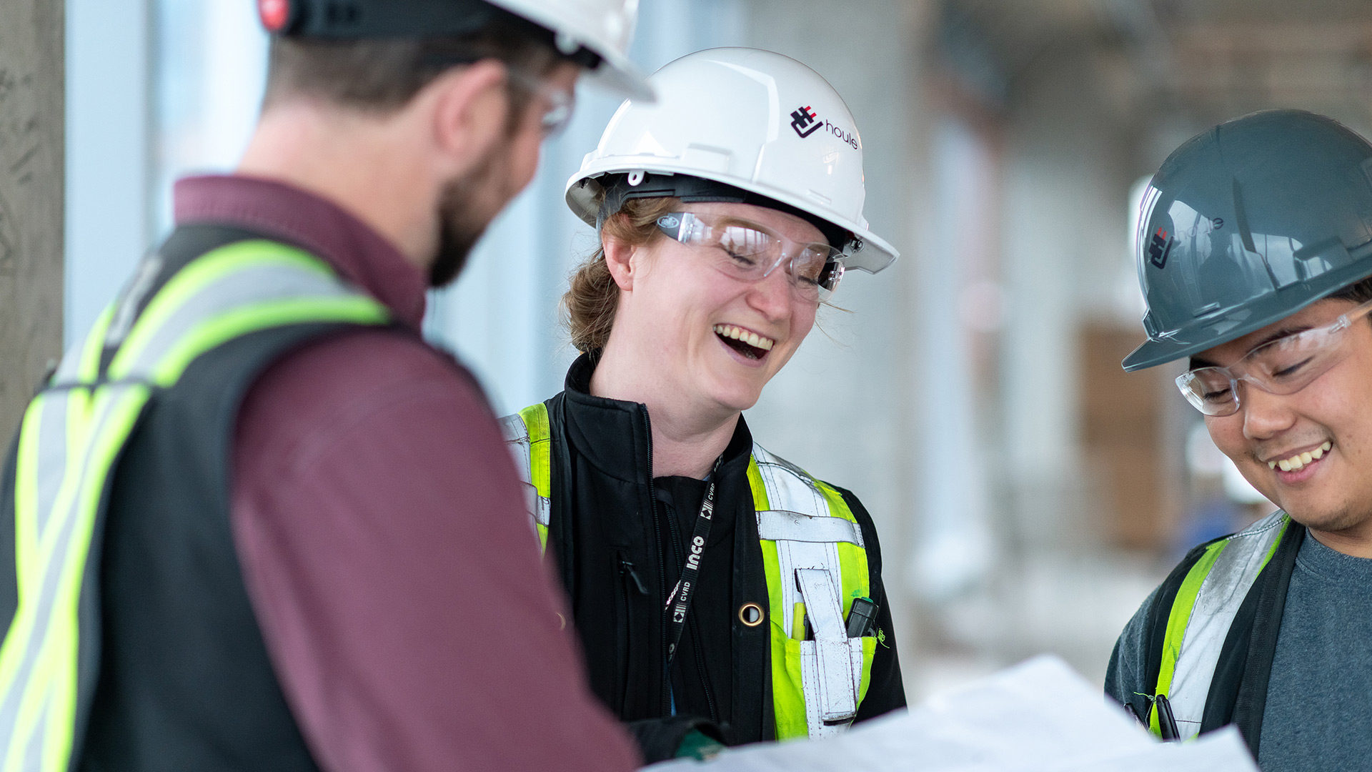 Three of the Houle team. The foreperson collaborating with field team.