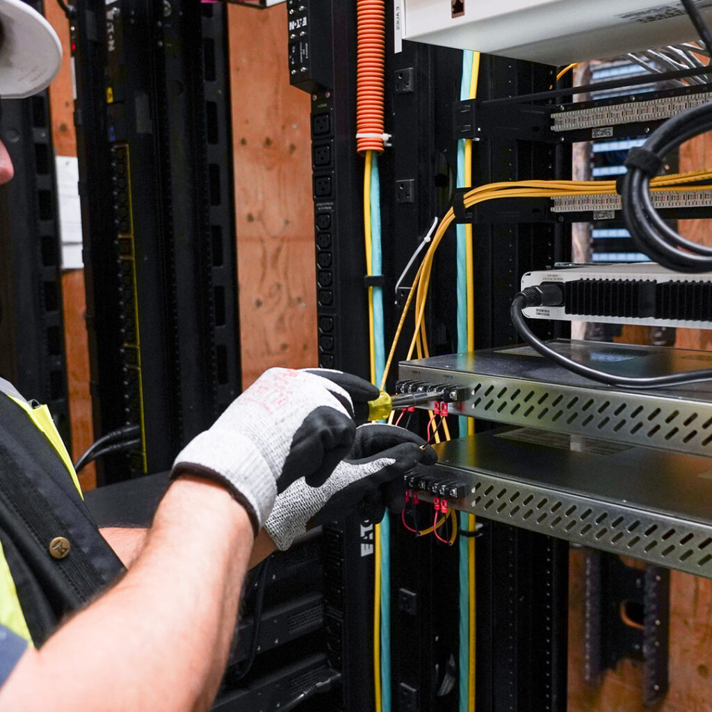 A Houle Technician work at the Abbotsford Regional Hospital and Cancer Centre Communications room